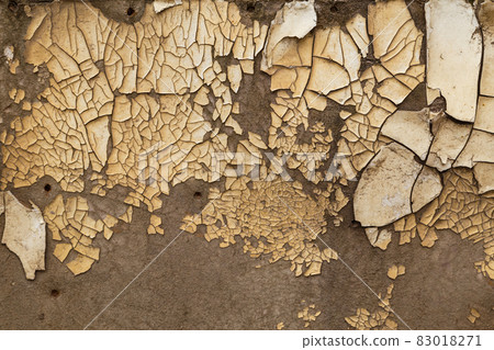 peeled off white paint on old rotten fibreboard surface 83018271