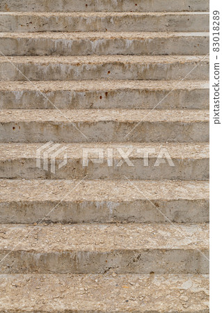 the base of the stairs after the cement has set - frontal full frame view 83018289