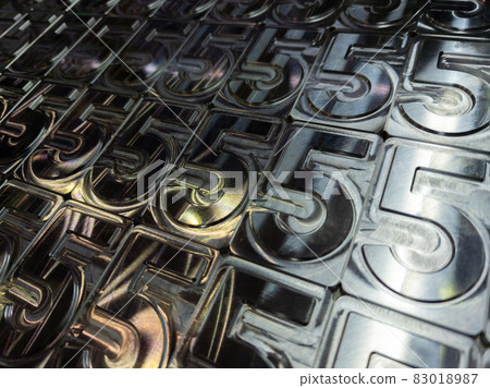 shiny metal machined digit 5 plates tiled tightly - full frame background shiny metal machined digit 5 plates tiled tightly - full frame background 83018987