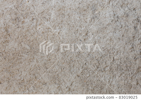 rough and bumpy cement industrial wall - flat texture and background rough and bumpy cement industrial wall - flat texture and background 83019025