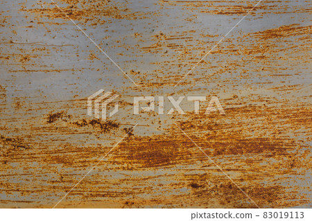 rusted flat solid sheet metal surface background and texture with leftovers of white paint, vertical orientation 83019113