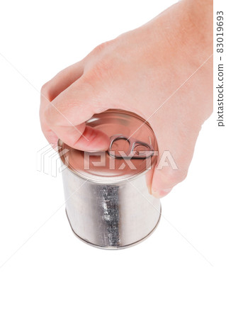 bare caucasian hand opens a tin can with a pull ring on a white background 83019693