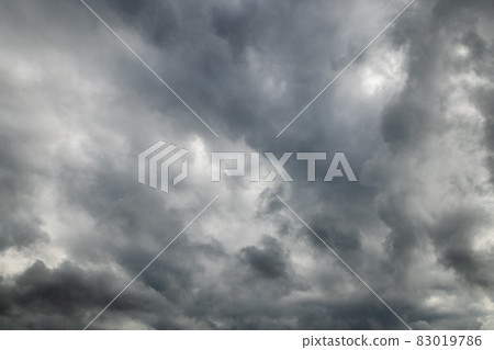 grey incoming storm clouds full frame background 83019786
