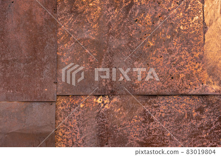 Rusted tin sheets patchwork wall texture and flat full frame background Rusted tin sheets patchwork wall texture and flat full frame background 83019804