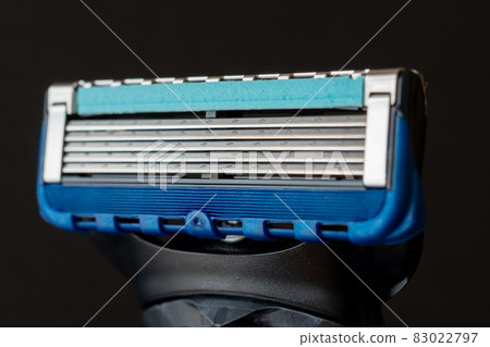 Close-up of a 5-blade razor (black background) Close-up of a 5-blade razor (black background) 83022797