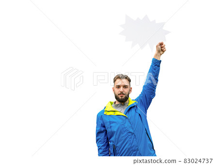 Young inspired man holding blank speech bubble over head on white background Young inspired man holding blank speech bubble over head on white background 83024737