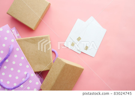 credit cards and gift box on pink background credit cards and gift box on pink background 83024745