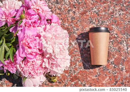 Coffee to go paper cup. Latte mug outdoors. Hot drink container Coffee to go paper cup. Latte mug outdoors. Hot drink container 83025540