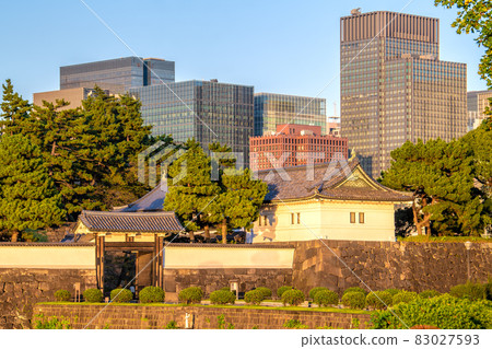 Tokyo cityscape of Japan overlooking Sakuradamon, Marunouchi, Otemachi and other office districts that are dyed orange in the setting sun Tokyo cityscape of Japan overlooking Sakuradamon, Marunouchi, Otemachi and other office districts that are dyed orange in the setting sun 83027593