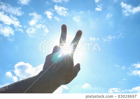Sun and male hands Sun and male hands 83028697