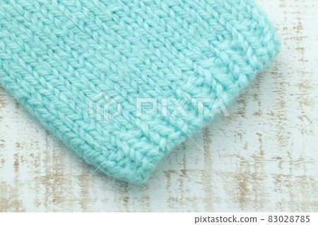 Ribbed cuffs of hand-knitted sweater 83028785
