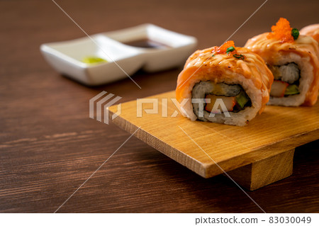 grilled salmon sushi roll with sauce 83030049
