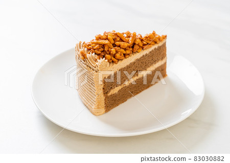 coffee almonds cake on plate 83030882