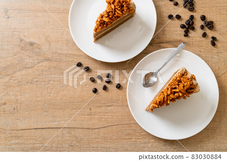 coffee almonds cake on plate 83030884