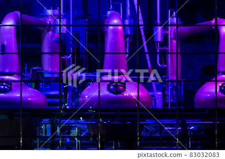 Copper stills for the production of irish Whiskey seen from the public aquare in Ardara, County Donegal - Ireland Copper stills for the production of irish Whiskey seen from the public aquare in Ardara, County Donegal - Ireland 83032083