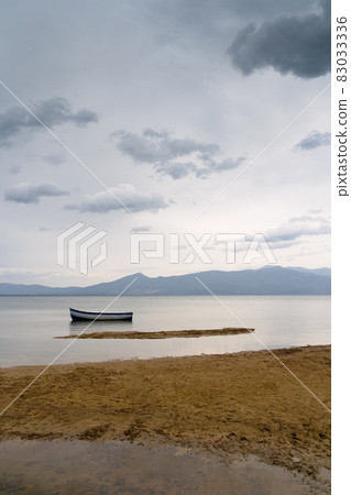 lonely boat on lake Prespa North Macedonia 83033336
