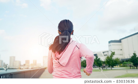 Woman jogging Woman jogging 83033636