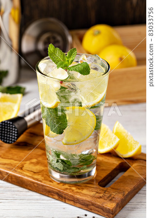 Glass of fresh lemonade Glass of fresh lemonade 83033756