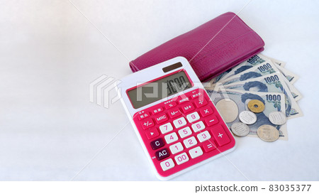 Long wallet, calculator, bills and coins 83035377