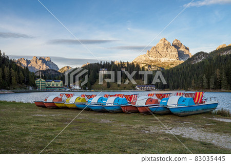 Lake Misurina or Lago di Misurina with pedal boats. View on the majestic Dolomites Alp Mountains, Tre Cime di Lavaredo peaks, South Tyrol, Italy Lake Misurina or Lago di Misurina with pedal boats. View on the majestic Dolomites Alp Mountains, Tre Cime di Lavaredo peaks, South Tyrol, Italy 83035445