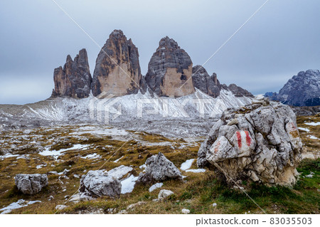 View of famous Tre Cime peaks in Tre Cime di Lavaredo National Park, Dolomiti Alps, South Tyrol, Italy View of famous Tre Cime peaks in Tre Cime di Lavaredo National Park, Dolomiti Alps, South Tyrol, Italy 83035503