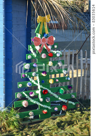 Dressed Christmas tree outdoor in the city Dressed Christmas tree outdoor in the city 83035614