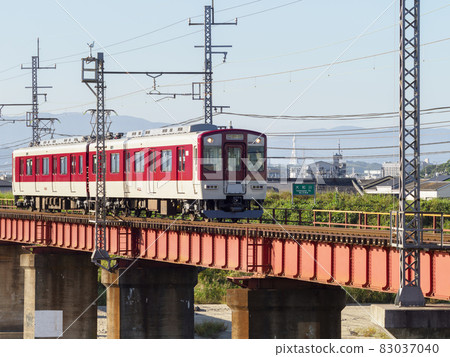 Kintetsu Myoji Line train crossing the Yamato River 83037040
