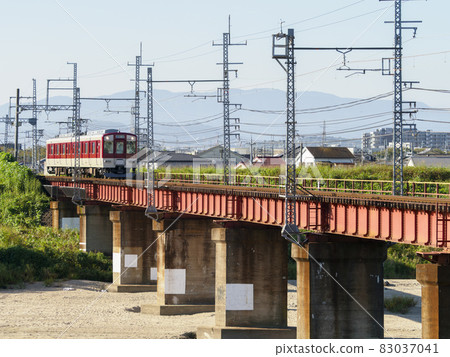 Kintetsu Myoji Line train crossing the Yamato River 83037041