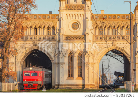 Railway station building facade at sunset. It was built in 1855-1857 yy. Petergof (near Saint Petersburg). Railway station building facade at sunset. It was built in 1855-1857 yy. Petergof (near Saint Petersburg). 83037265