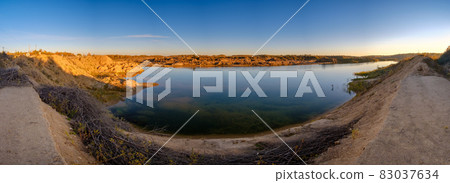 Landscape of abandoned quarry looks like Mars 83037634