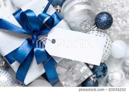 Christmas Gift Box with blank gift tag, Mockup Christmas Gift Box with blank gift tag, Mockup 83038202