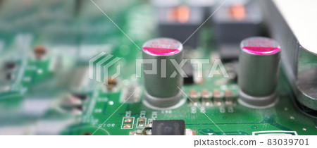 Semiconductor. cpu chip located on the green motherboard of the computer. Semi conductor motherboard circuit board. Hightech computer board with manufacture chip pcb technology. Smart phone iot chip. 83039701