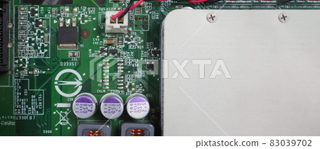 Semiconductor. cpu chip located on the green motherboard of the computer. Semi conductor motherboard circuit board. Hightech computer board with manufacture chip pcb technology. Smart phone iot chip. Semiconductor. cpu chip located on the green motherboard of the computer. Semi conductor motherboard circuit board. Hightech computer board with manufacture chip pcb technology. Smart phone iot chip. 83039702