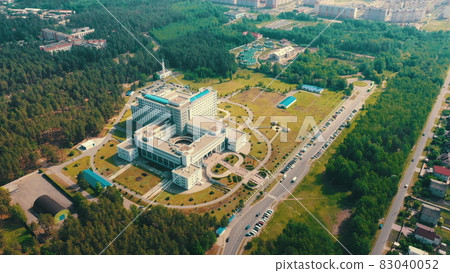 Gomel, Belarus. Aerial View OF Building Of Republican Scientific Center For Radiation Medicine And Human Ecology In Summer Day. Top View. Bird's Eye View Gomel, Belarus. Aerial View OF Building Of Republican Scientific Center For Radiation Medicine And Human Ecology In Summer Day. Top View. Bird's Eye View 83040052