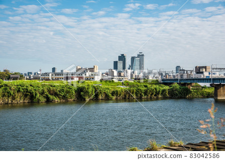 《Aichi Prefecture》 Nagoya cityscape from Shonai River towards Meieki 83042586