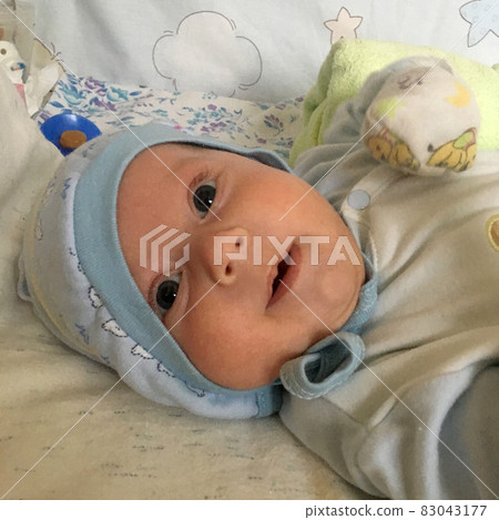 Beautiful baby boy with child face posing photographer 83043177