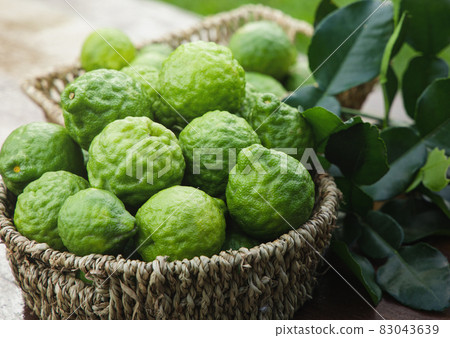 fresh bergamot fruit on wooden table 83043639