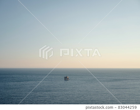 metal structure in a blue calm sea 83044259