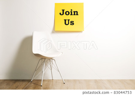 Head hunting help wanted poster concept. Minimalistic composition with chair and blank copy space wall. Head hunting help wanted poster concept. Minimalistic composition with chair and blank copy space wall. 83044753