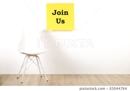 Head hunting help wanted poster concept. Minimalistic composition with chair and blank copy space wall. Head hunting help wanted poster concept. Minimalistic composition with chair and blank copy space wall. 83044764