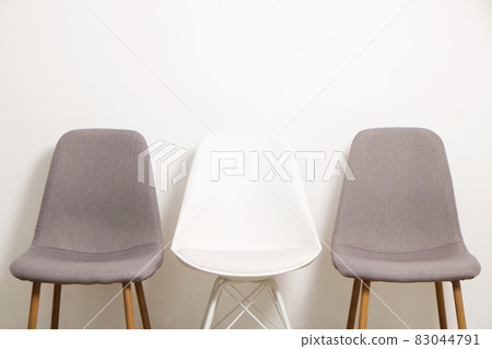 Empty chairs. Vacant job position concept. Minimlistic interior lofty room with elegant furniture pieces. Empty chairs. Vacant job position concept. Minimlistic interior lofty room with elegant furniture pieces. 83044791