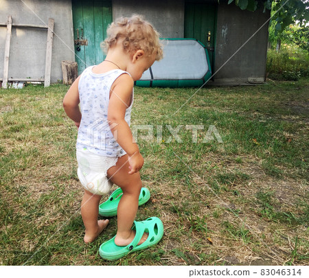 Beautiful baby boy with child face posing photographer 83046314