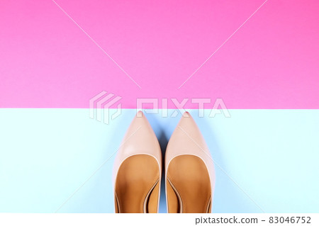 Top view of fashionable feminine medium heeled women's leather shoes of pastel colors on heels / wedge for spring-summer season. Top view of fashionable feminine medium heeled women's leather shoes of pastel colors on heels / wedge for spring-summer season. 83046752