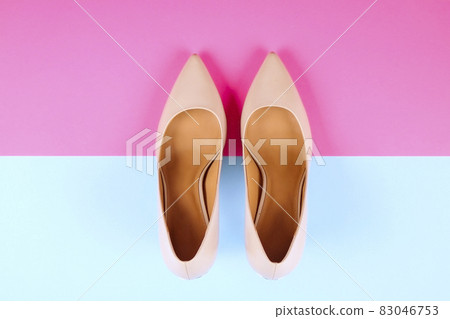 Top view of fashionable feminine medium heeled women's leather shoes of pastel colors on heels / wedge for spring-summer season. Top view of fashionable feminine medium heeled women's leather shoes of pastel colors on heels / wedge for spring-summer season. 83046753
