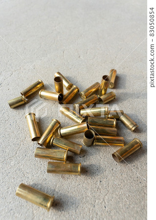 Empty Bullet Casings Over White Background Stock Photo, Picture