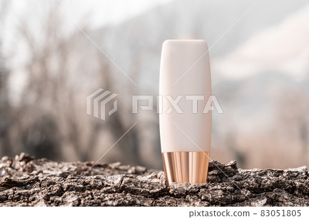 Foundation mock up bottle on natural wooden bark background. Facial concealer tube mockup. 83051805