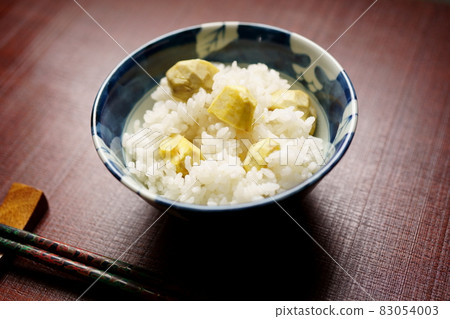 Chestnut rice served in a bowl Chestnut rice served in a bowl 83054003