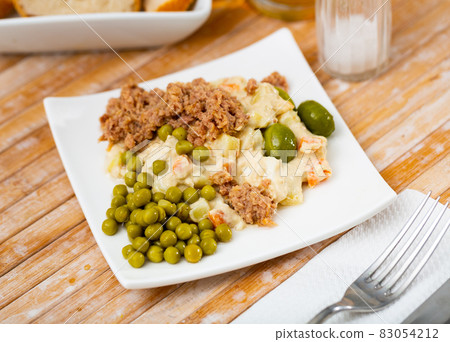 Spanish salad called Ensalada rusa 83054212