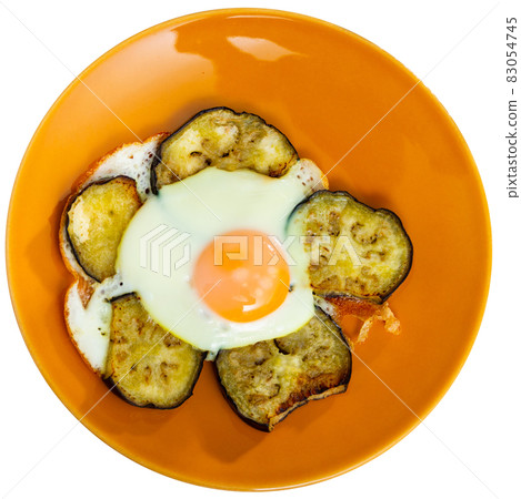 Appetizing fried eggs made with eggplants Appetizing fried eggs made with eggplants 83054745
