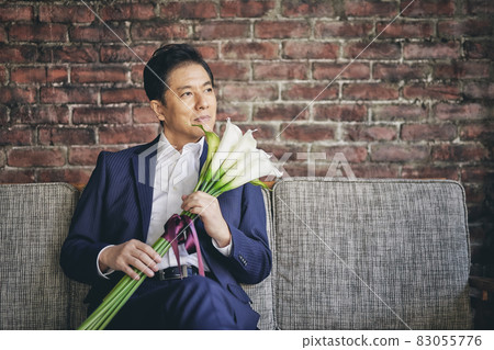Male portrait with flowers 83055776
